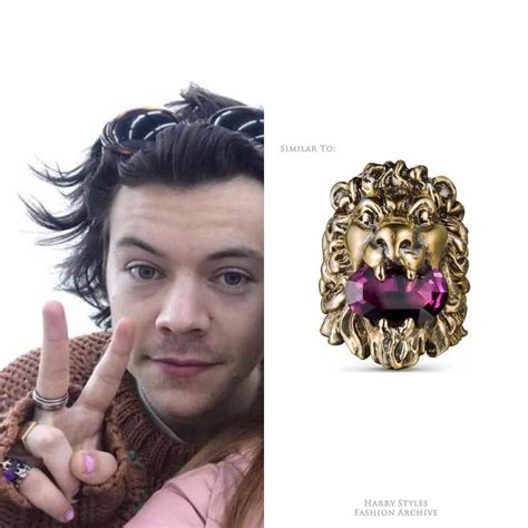 gucci lion head ring with green crystal|harry styles Gucci lion ring.